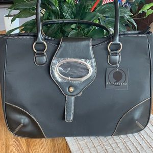 New with tag apostrophe bag.